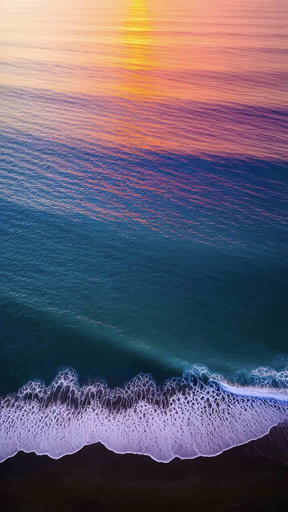 Ocean Waves Sunset Aerial View Vibrant Wallpaper